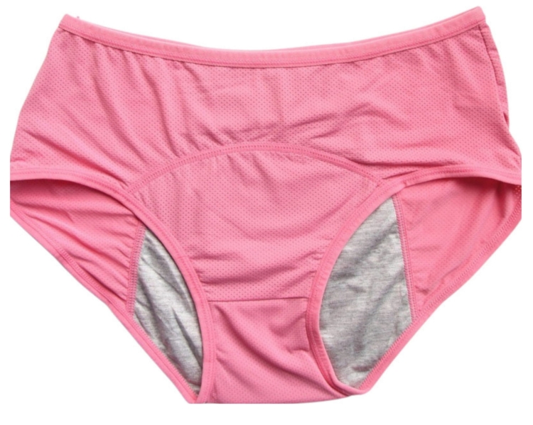 Wnętrze różowych majtek menstruacyjnych prezentujące szeroki obszar ochrony wkładki.