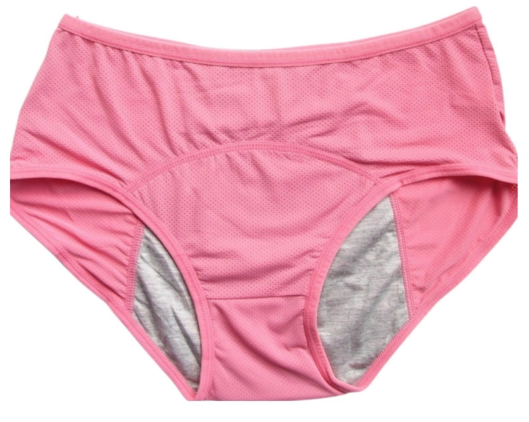 Wnętrze różowych majtek menstruacyjnych prezentujące szeroki obszar ochrony wkładki.