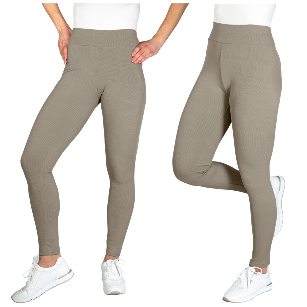 Legginsy damskie z wysokim stanem dopasowane w kolorze beżowym prezentowane na modelce.